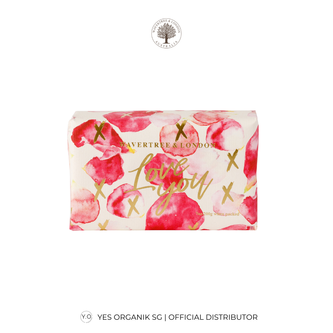 Soap bar with floral design and 'love you' text on a white background